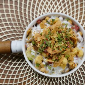 A vibrant and healthy chickpea salad with fresh ingredients viewed from above.